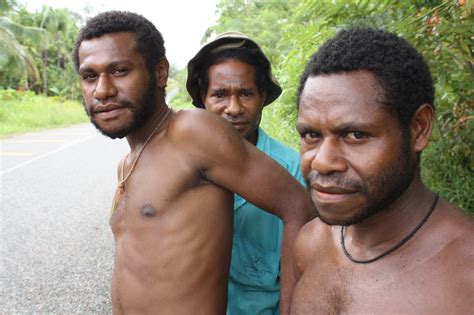 A group of young men in northern Madang Province. Papua New Guinea is ...