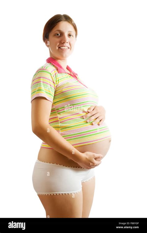 Portrait of 9 months pregnant woman over white Stock Photo - Alamy