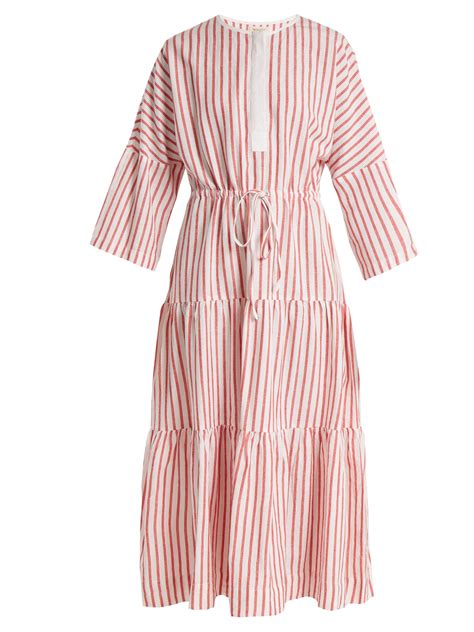 Click here to buy Wiggy Kit Tiered ruffled striped cotton-blend maxi ...