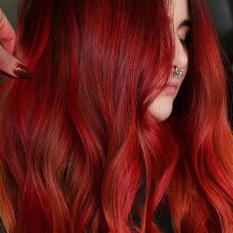 29 Stunning Dark Red Hair Colors We're Tempted to Try