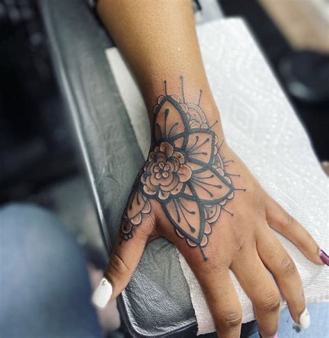 The Popularity Of Flower Tattoos On Hands In 2023 - ketofoodchart