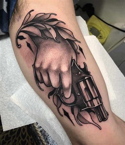 Aggregate 68+ tattoos of guns on hands latest - in.coedo.com.vn