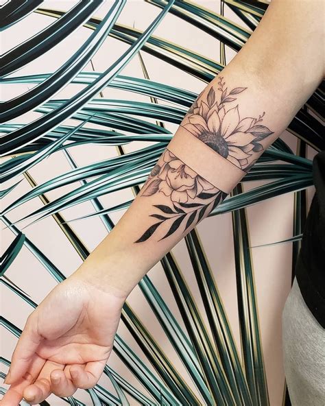 Fine line floral band tattoo | Arm band tattoo, Band tattoo, Forearm ...