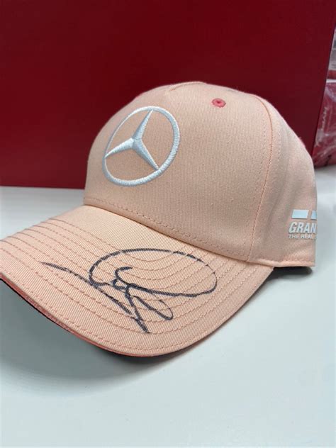 Charitybuzz: Lewis Hamilton Signed Caps