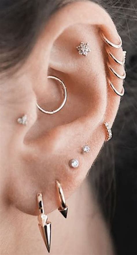 pretty ear piercing ideas multiple combinations cartilage helix daith ...