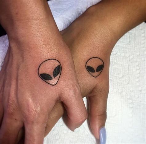 Discover 112+ alien finger tattoo super hot - vova.edu.vn