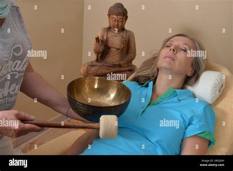 Sound therapy, singing bowls Stock Photo - Alamy