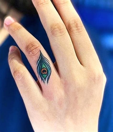 Discover more than 73 small peacock feather tattoo - in.coedo.com.vn