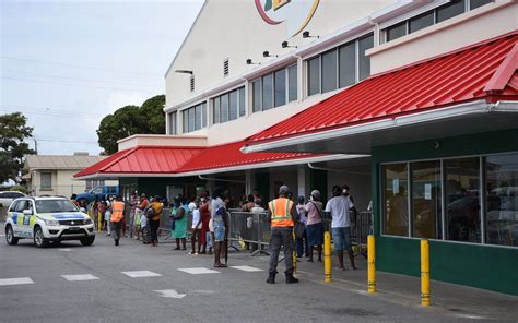 Shoppers endure more long lines to shop in supermarkets - Barbados ...