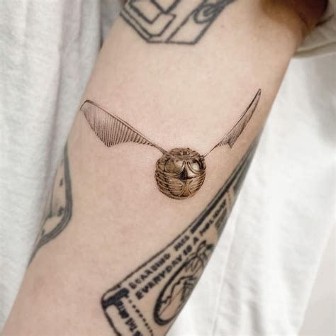 23 Best Golden Snitch Tattoo Ideas With Meaning - 91tattoos