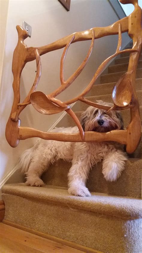 Bespoke carved Oak dog stair gate with an unhappy Polish Lowland ...