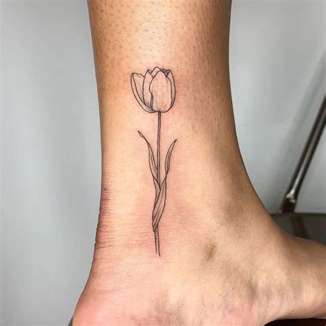 Enhance your girly vibes: 20+ Best Tulip Tattoo Ideas for Women in 2023