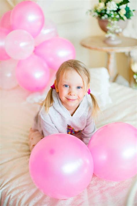 Little Girl Playing with Pink Balloons Stock Photo - Image of caucasian ...