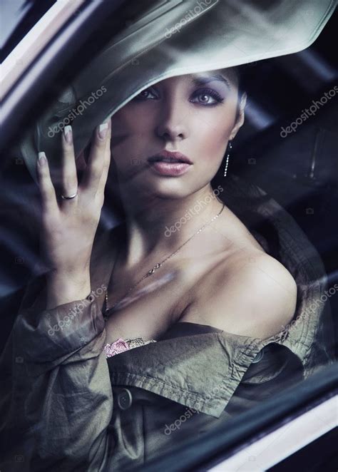 A classy young lady wearing fashionable hat — Stock Photo © konradbak ...