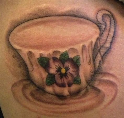 Cup runneth over tea cup tattoo | Cup tattoo, Wrist tattoos, Skin art