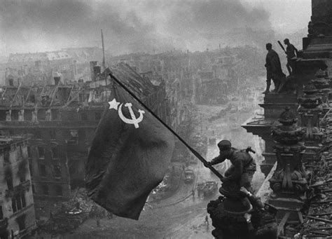 Soldiers raising the Soviet flag over the Reichstag, Berlin 1945