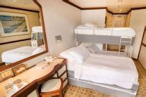 Pacific Adventure cabins and suites | CruiseMapper