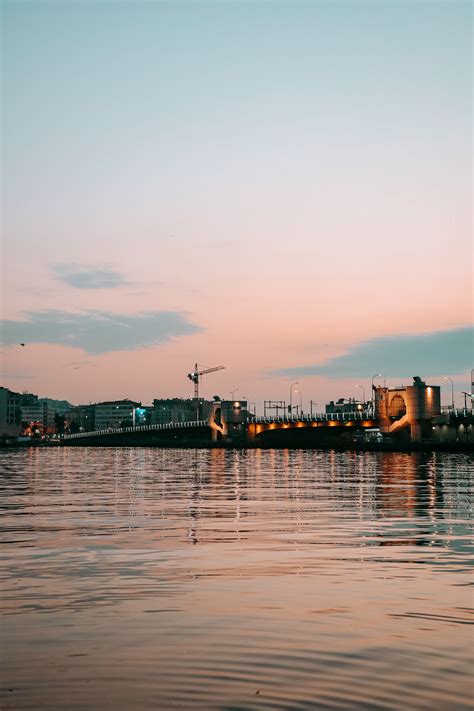 Train on Rail Tracks at Sunset · Free Stock Photo