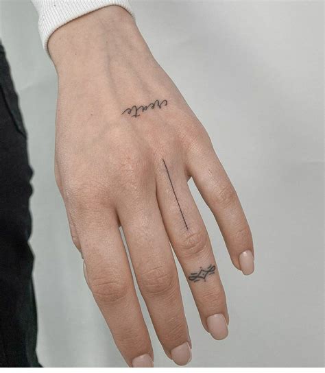 Pin on BERGMAN BABY | Hand tattoos, Small hand tattoos, Tattoos