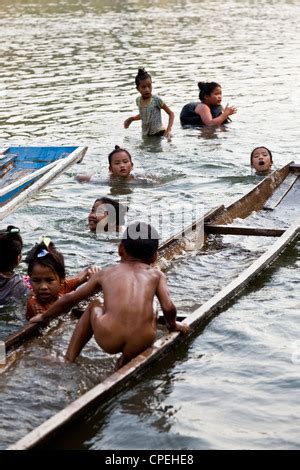 Children bathing and playing in the river, something that is very ...