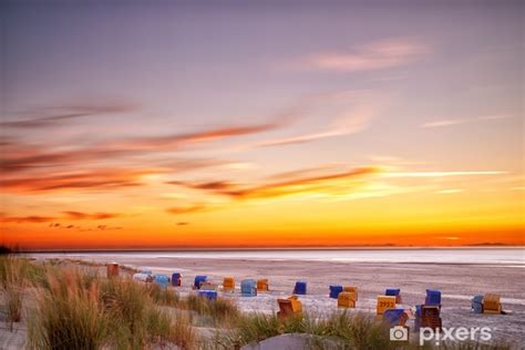 Wall Mural Sunset at the beach on the East Frisian Island Juist in the ...