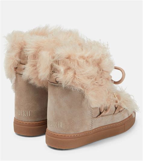 Inuikii Shearling and leather ankle boots Inuikii