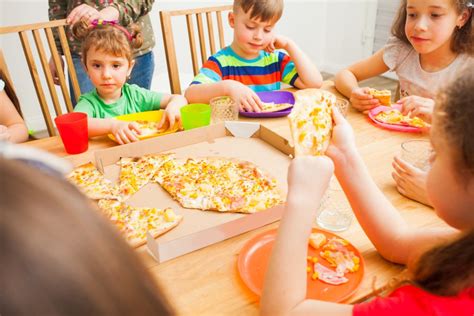 Children eating pizza (620092) | Food and Drink | Design Bundles