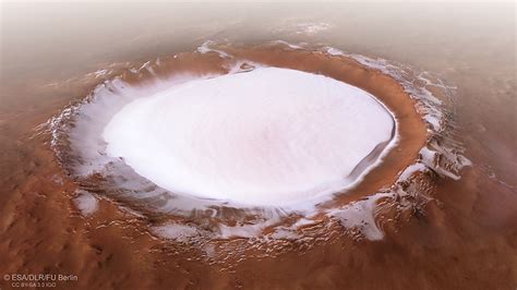 Polar ice caps may reveal climate history of Mars - Department of Earth ...