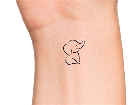 Details 83+ simple small elephant tattoo latest - in.coedo.com.vn