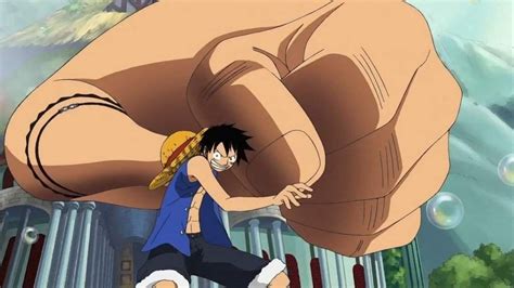 the anime character naruta is holding on to an enormous object in front ...