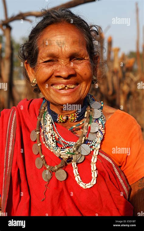 Portrait of a tribal woman wearing traditional jewellery. Baiga tribe ...