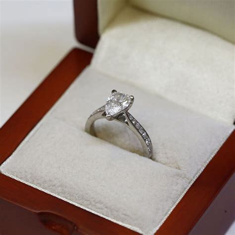 Pear Shape Diamond Tapered Pave Setting Engagement Ring | Reve Diamonds