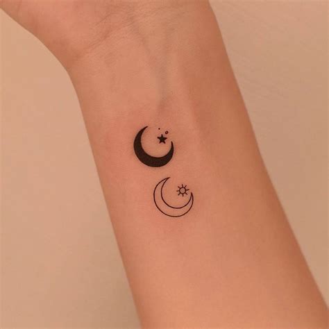 Sun and moon tattoo on the wrist