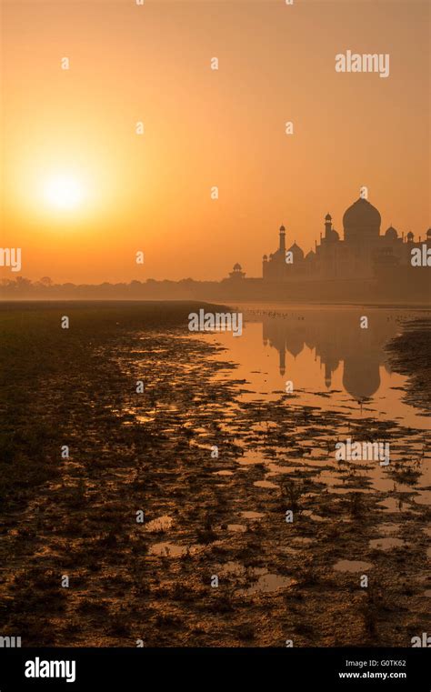 Taj Mahal view with reflection from Yamuna river bank. Picture shot ...