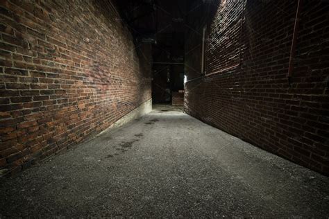 Scary empty dark alley brick walls | High-Quality Architecture Stock ...