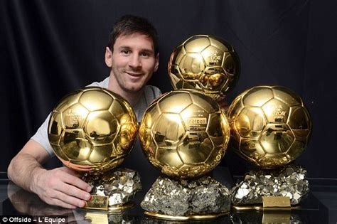 Lionel Messi poses with his FOUR Ballon d'Or trophies - pictures ...