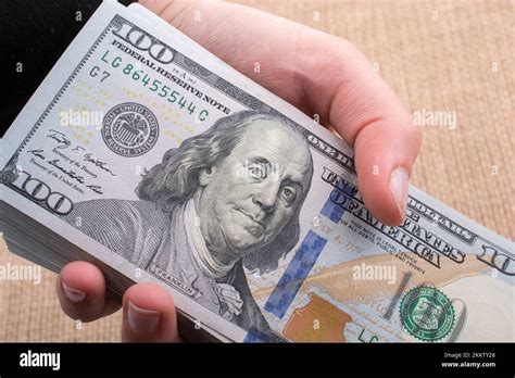 Close up of Benjamin Franklin face on 100 US dollar bill Stock Photo ...