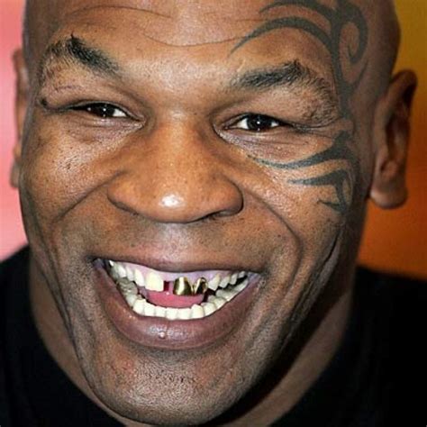 Mike Tyson Says Pet Tiger Knocked His Teeth Out When He Tried To Kiss ...