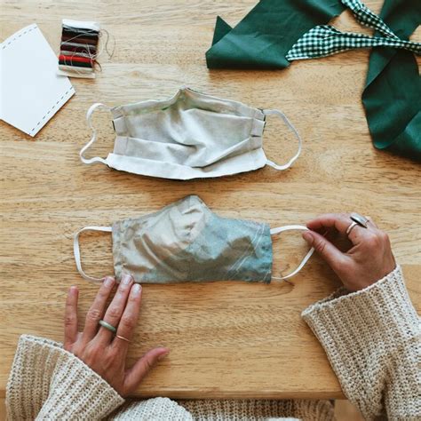 Premium Photo | Woman making a diy face mask during the coronavirus ...