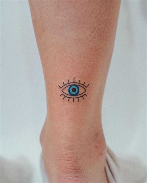 Evil eye tattoo by tattooist Bongkee inked on the right ankle | Idee ...