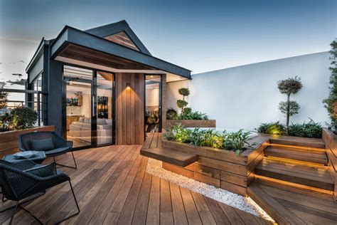 This rooftop has been turned into a living space for a family to relax ...