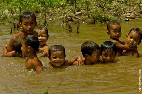 #Laos - Children Swimming © Michel Gotin