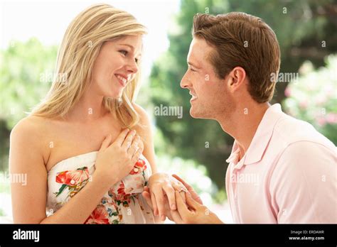 Kneeling man proposal ring hi-res stock photography and images - Alamy