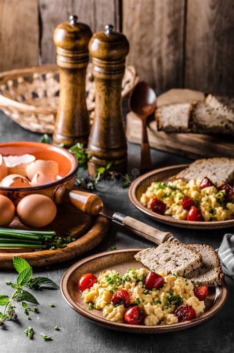 Scrambled eggs with herbs stock photo. Image of brunch - 108180996