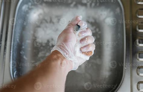 Cleaning kitchen sink. 5705286 Stock Photo at Vecteezy