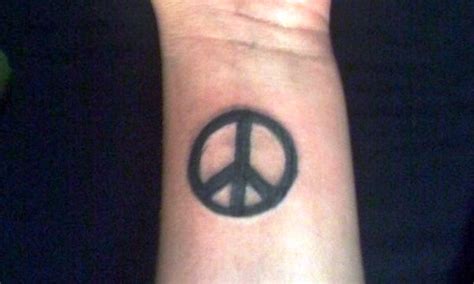 71 Superb Peace Wrist Tattoo Photos - Wrist Tattoo Designs