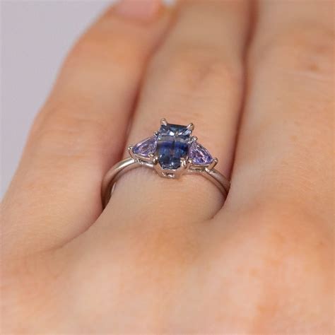 1.11ct Bicolor Emerald Cut Sapphire Three Stone Ring with Tanzanite Tr ...