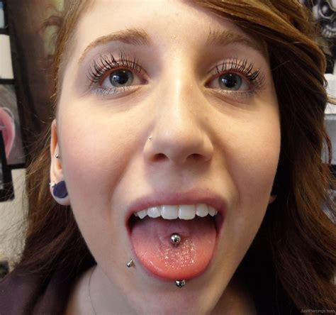 Labret And Vertical Tongue Piercing