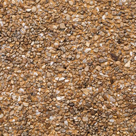 The pattern small brown pebbles stone as background. pebbles texture ...