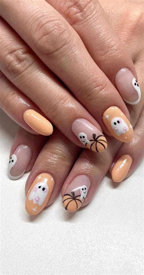 50 Cute Spooky Halloween Nail Ideas : Soft Peach Spooky Nails 1 - Fab ...